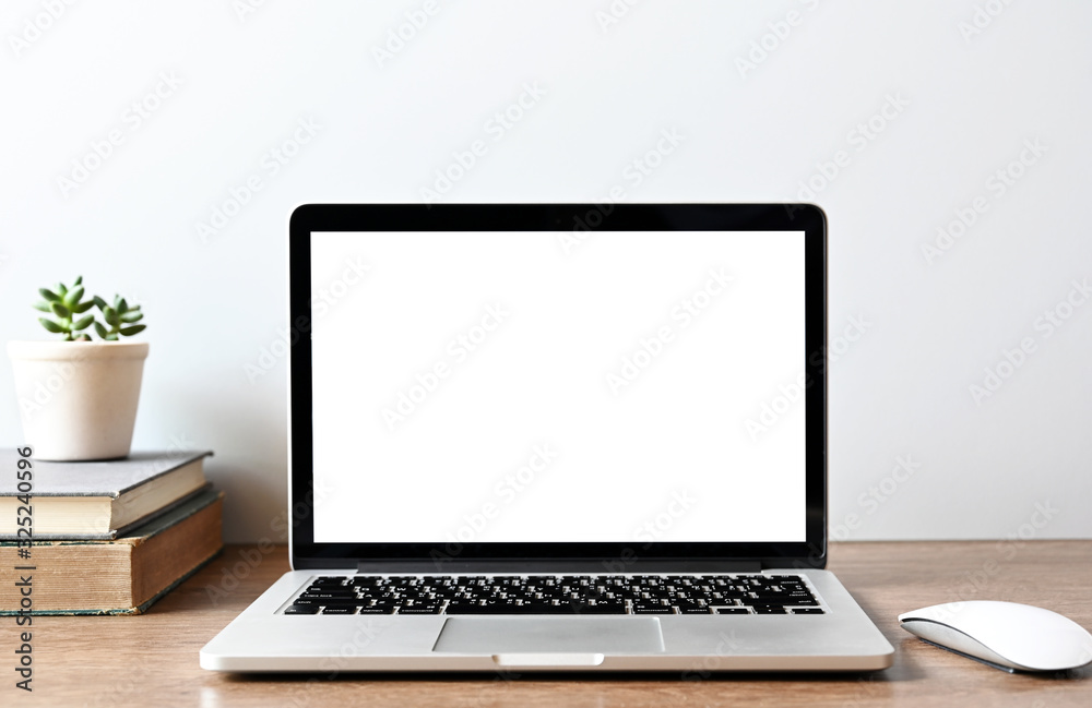 blank screen Modern laptop computer with mouse,Smart phone and Succulent on wood table in office view backgrounds blank screen Modern laptop computer with mouse,Smart phone and Succulent on wood table in office view backgrounds
