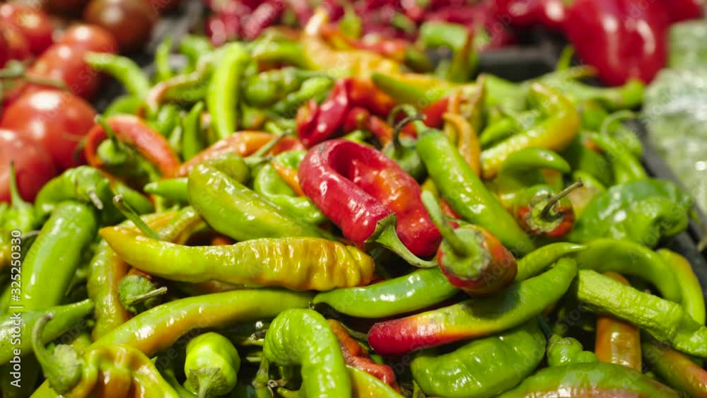 Fresh Raw hot green pepper in a counter of market Fresh Raw hot green pepper in a counter of market
