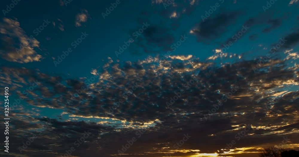 Time lapse at the Kings Canyon, Australia. Amazing colorful sunrise at the Kings Canyon Resort Campground at the Wakarra national park northern territory Australia. Fast moving clouds in the morning Time lapse at the Kings Canyon, Australia. Amazing colorful sunrise at the Kings Canyon Resort Campground at the Wakarra national park northern territory Australia. Fast moving clouds in the morning