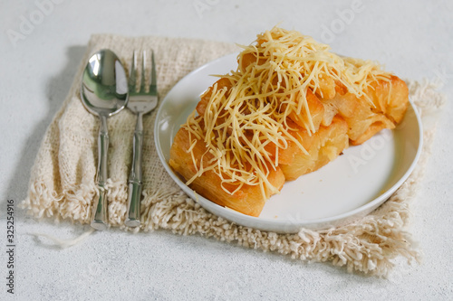 Deep fried cassava root. Brazilian Mandioca Frita (deep fried cassava/ manioc/yuca). Feijoada side dish photo