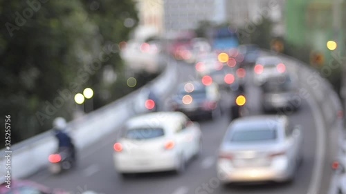 Wallpaper Mural POV beautiful glittering bokeh in blurry background of traffic jam. The round colorful bokeh shine from car lights in traffic jam in city street. Abstract concept transportation. Abstract background. Torontodigital.ca