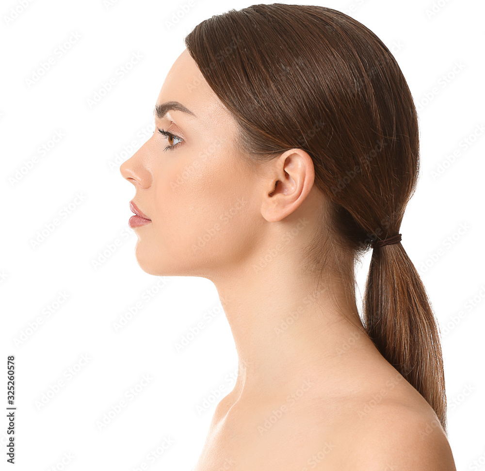 Beautiful young woman on white background. Plastic surgery concept Beautiful young woman on white background. Plastic surgery concept