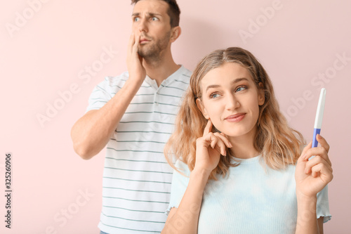 Emotional young couple with...