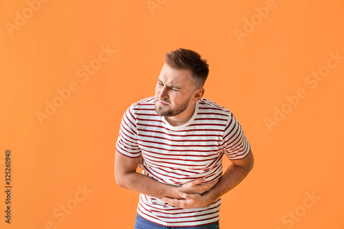 Young man suffering from ab...
