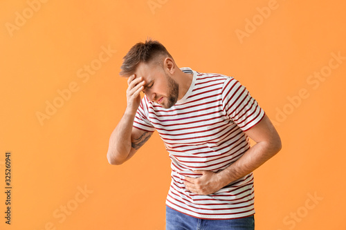 Young man suffering from ab...