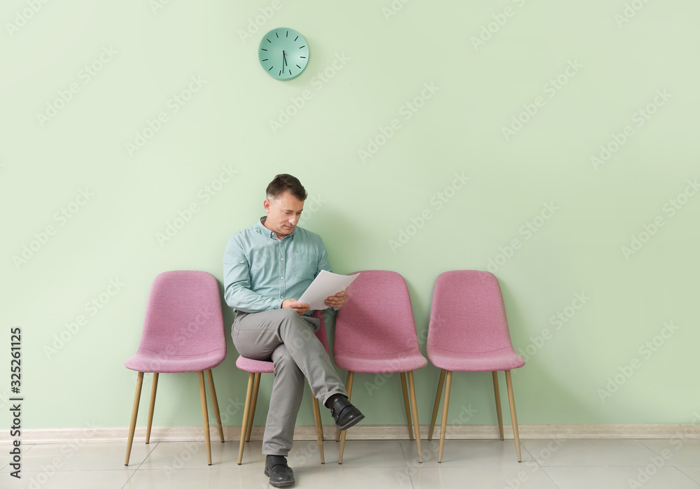 Fototapeta premium Mature man waiting for job interview indoors
