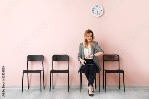 Young woman waiting for job...
