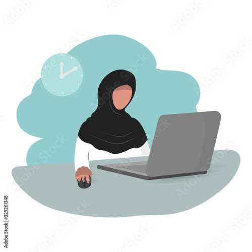 muslim woman working with computer laptop