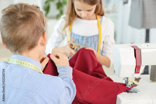 Cute little tailors working...