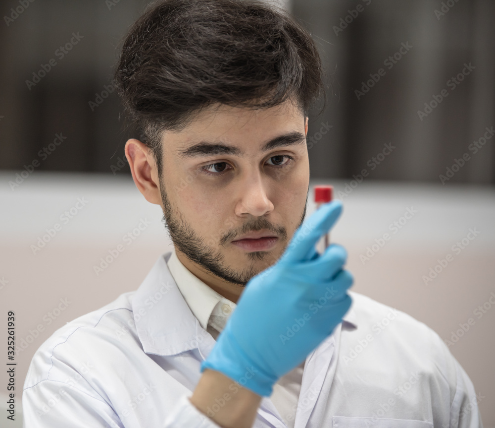 Medical scientists are analyzing patient specimens in hospital laboratories. Medical scientists are analyzing patient specimens in hospital laboratories.