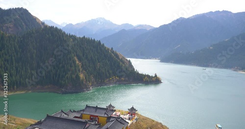 Nature landscape view Heaven Lake of Celestial Mountains and Taoist Heavenly Queen Mother temple in Xinjiang China.