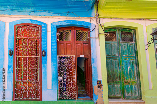 Scenic colorful Old Havana streets in historic city center (Havana Vieja) near Paseo El Prado and Capitolio photo