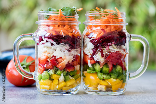 Healthy and easy lunch rich in phytochemicals  packed in two mason jars photo