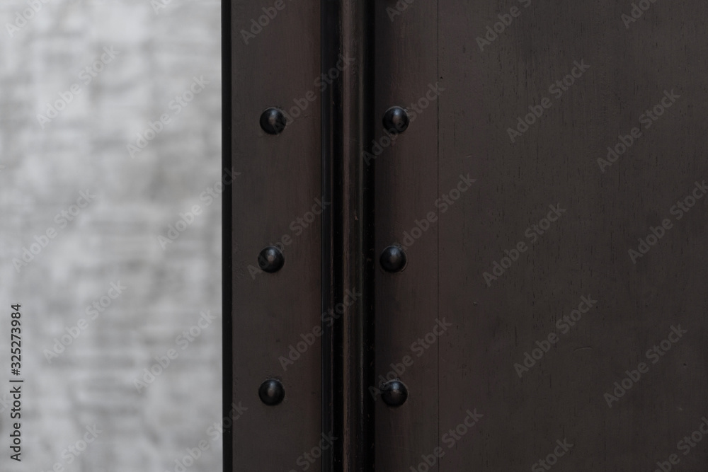 part of industrial loft metal iron black door style and white grey cement wall architecture background