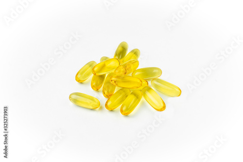 Wallpaper Mural shiny yellow vitamin e fish oil capsule isolated on white background Torontodigital.ca