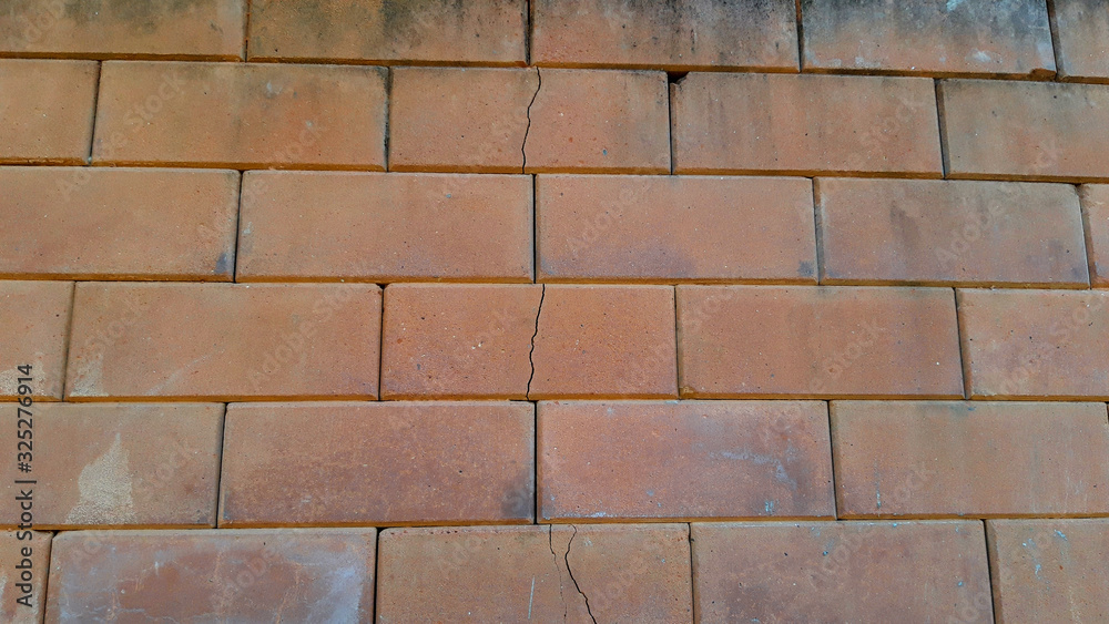 Fototapeta premium The crack in the brick wall.