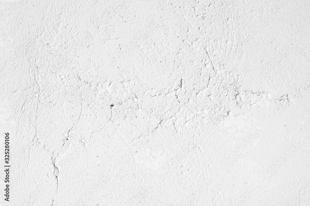 Obraz premium White rough whitewashed wall texture
