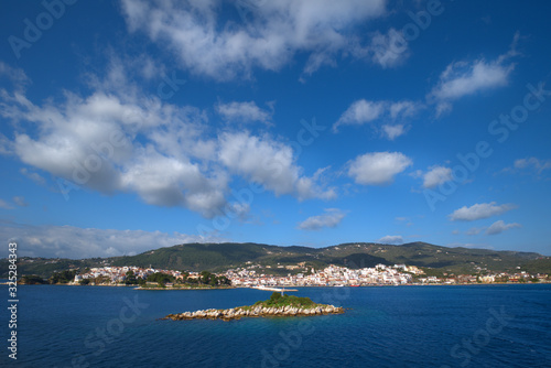 Skiathos island , the most famous island of Greece is one of the most famous Greek destinations in the whole world, here we see a view of the island from a ship. Famous for its beaches, one of the bes