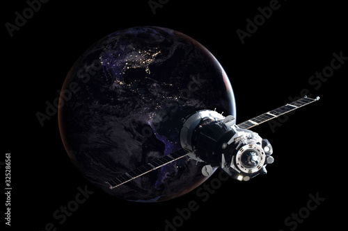 Fototapeta Naklejka Na Ścianę i Meble -  Russian manned spacecraft in orbit around the Earth. Elements of this image furnished by NASA.