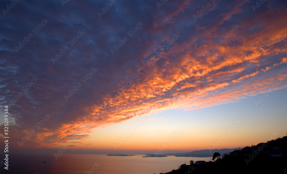 Sunset , sunset on the islands of the Aegean, Greece, SporadesGreece , Mediterranean Sea ,  Aegean sea  ,  Skiathos island  ,Skopelos island vacation in Greece .