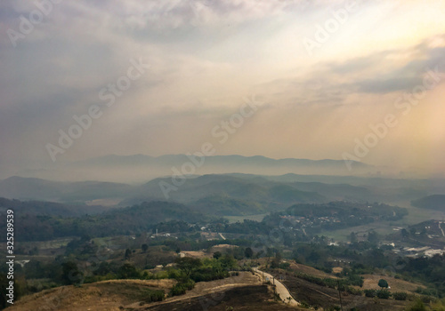 The landscape of mountains is full of clouds and fog. A top view of the haze in the mountains And fog in the morning at Doi Sako Mountain  Chiang Saen  Thailand.