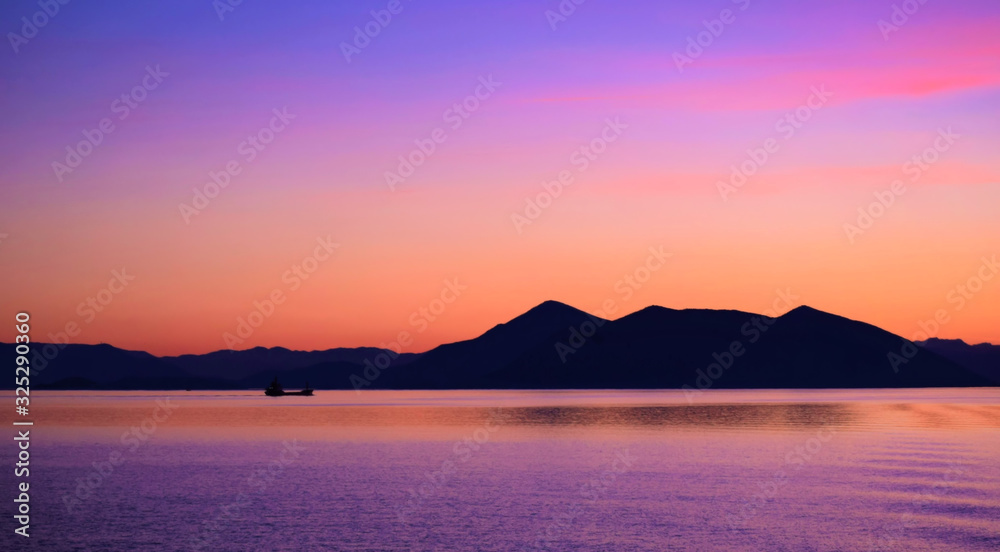 Sunset , sunset on the islands of the Aegean, Greece, SporadesGreece , Mediterranean Sea ,  Aegean sea  ,  Skiathos island  ,Skopelos island vacation in Greece .