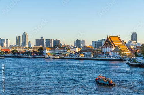 Photography In Bangkok with Chao Phraya River, Thai temple and Skyscraper in Bangkok city, Thailand