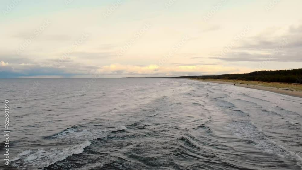Aerial view of seagull chasing drone in baltic state Latvia sea shore Aerial view of seagull chasing drone in baltic state Latvia sea shore