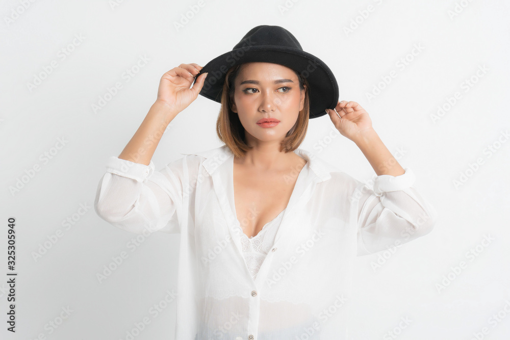 Beautiful portrait asian woman brown short bob wearing black hat and white shirt in stand position with fashion on isolated white background. Beautiful portrait asian woman brown short bob wearing black hat and white shirt in stand position with fashion on isolated white background.