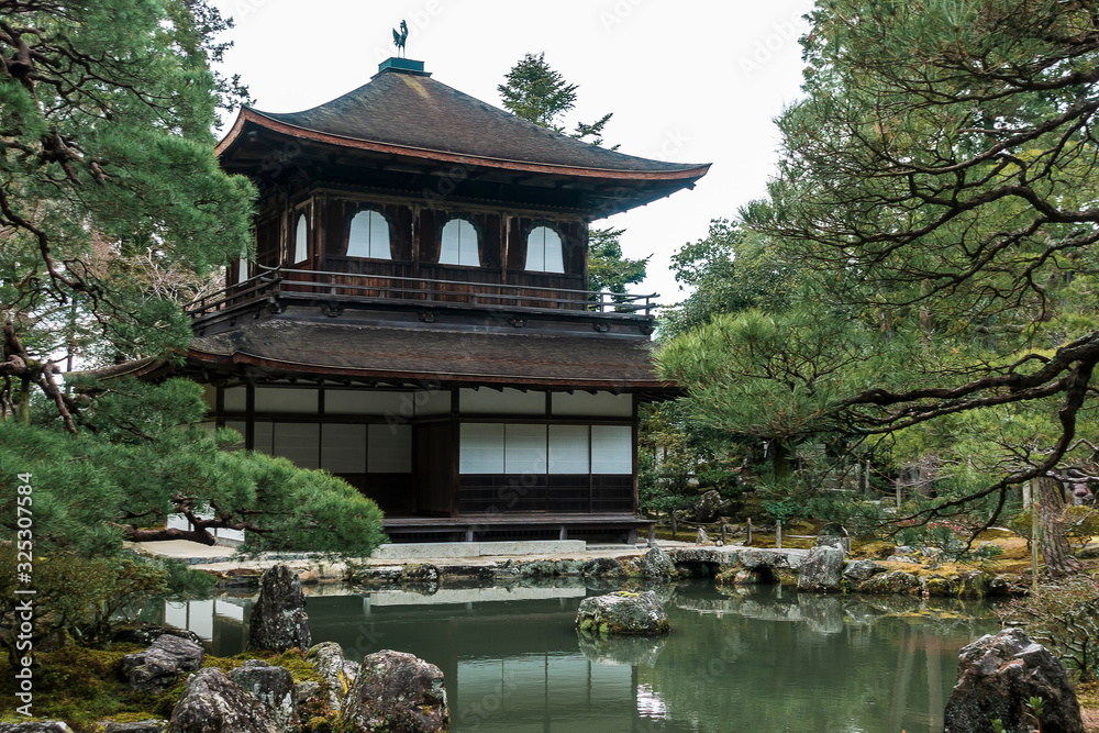 concept of Travel and landmarks Kyoto, Japan. Beautiful Architecture at Silver Pavilion or Ginkakuji temple on the background of the Japanese forest. winter. Buddhism concept of Travel and landmarks Kyoto, Japan. Beautiful Architecture at Silver Pavilion or Ginkakuji temple on the background of the Japanese forest. winter. Buddhism
