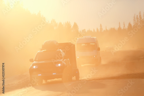 Fotografi hot summer day on the road landscape in traffic jam / abstract urban view in tra
