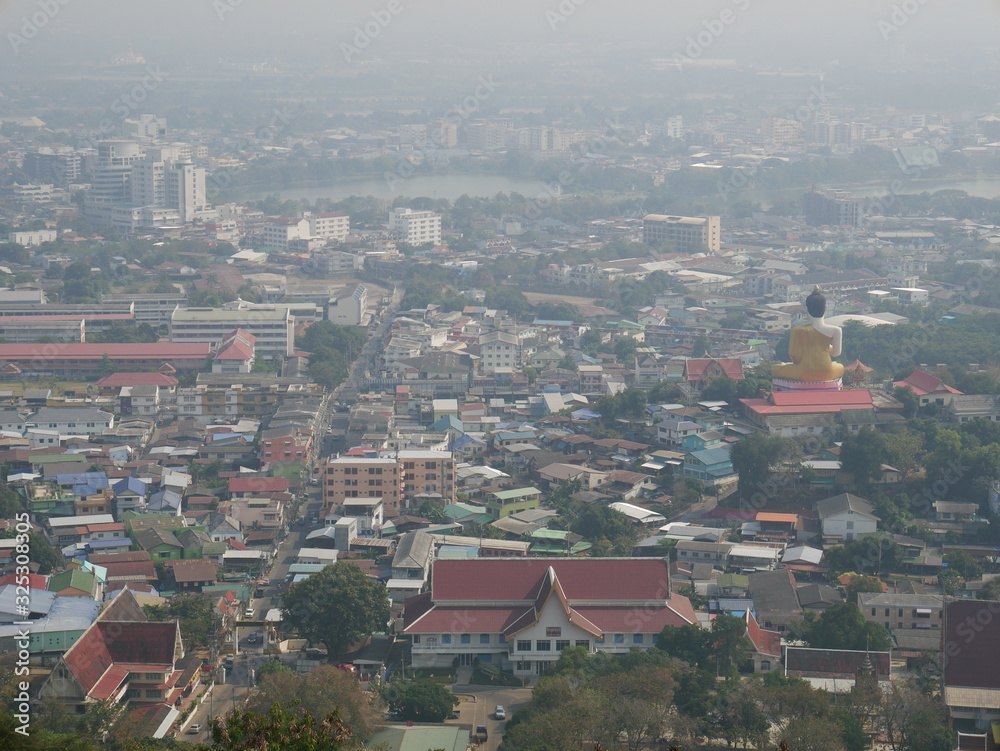 Nakhon Sawan, Thailand-February 16, 2018: cityscape and Buddha statue in Thailand