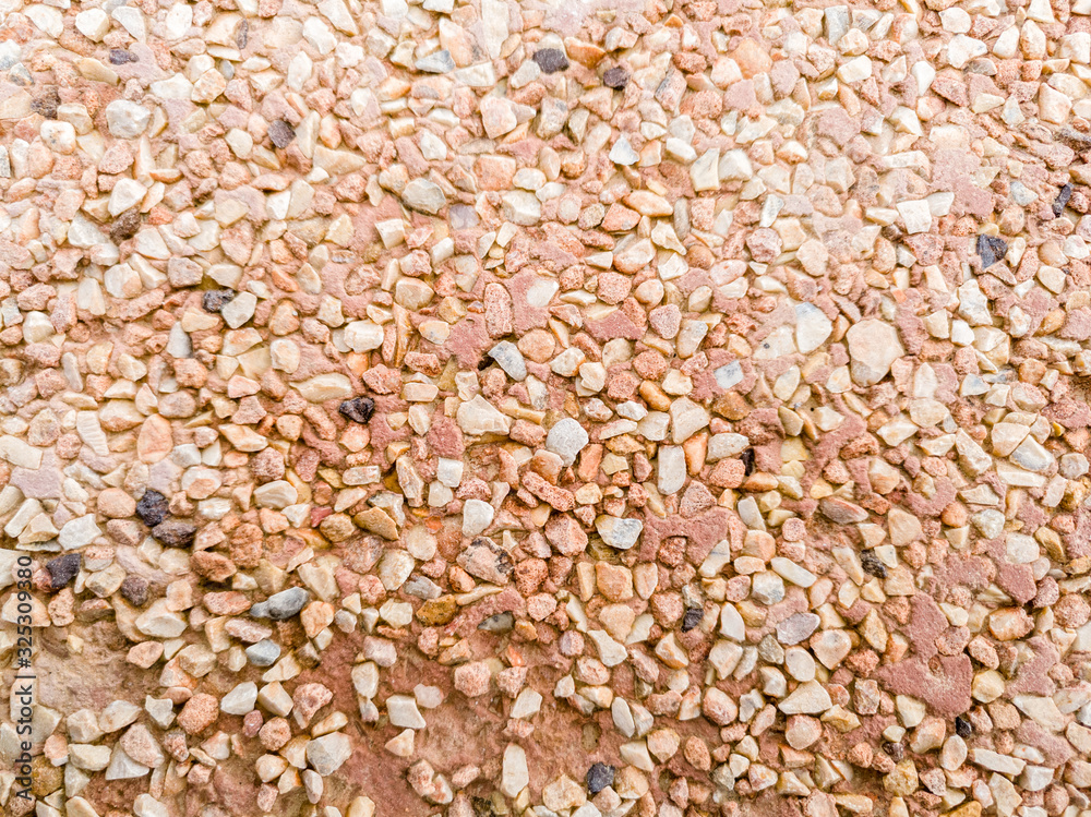 small stone surface background in brown color small stone surface background in brown color