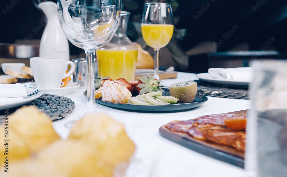 Beautiful image with traditional Spanish breakfast in a cozy restaurant