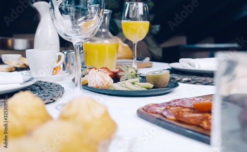Beautiful image with traditional Spanish breakfast in a cozy restaurant