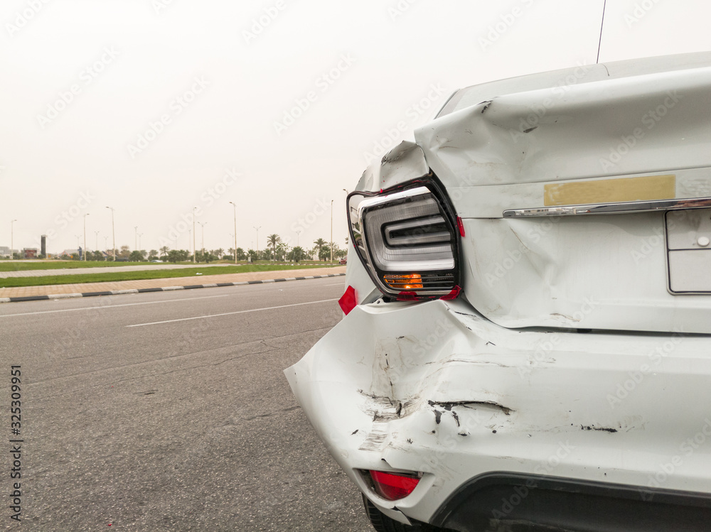a car meet an accident on a busy street a car meet an accident on a busy street
