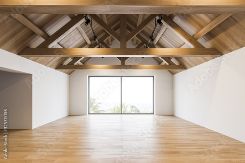 Empty spacious attic room interior