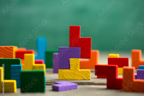 Creative solution for idea - business concept, jigsaw puzzle on the blackboard