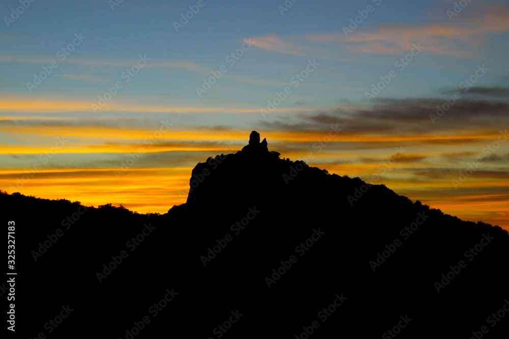 Obraz premium tower of capo d'uomo argentario silhouette