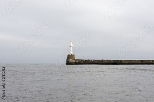 Lighthouse at South Breakwater at Aberdeen Harbour.