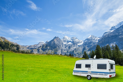 Caravan in a relaxing nature camp site at Switzerland