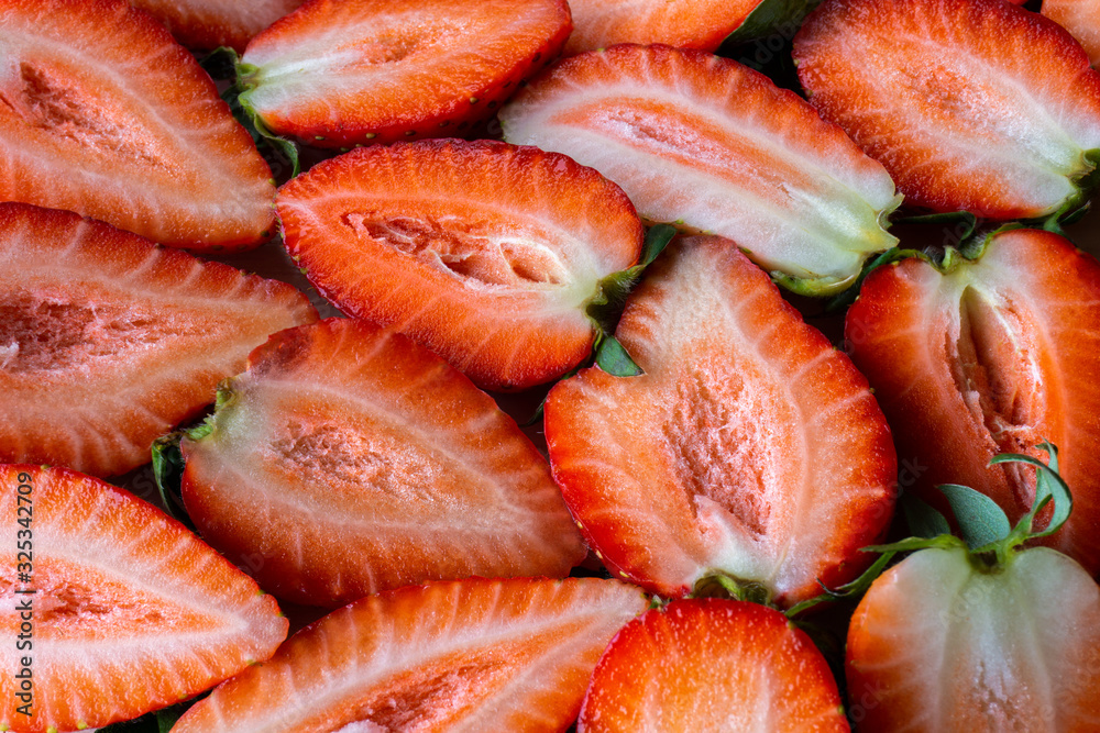 background of slices of fresh strawberries. background of slices of fresh strawberries.