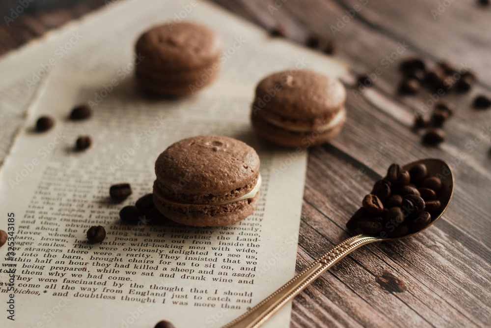 Macaroons. Delicious french dessert. Romantic composition with coffee and other elements. Macaroons. Delicious french dessert. Romantic composition with coffee and other elements.