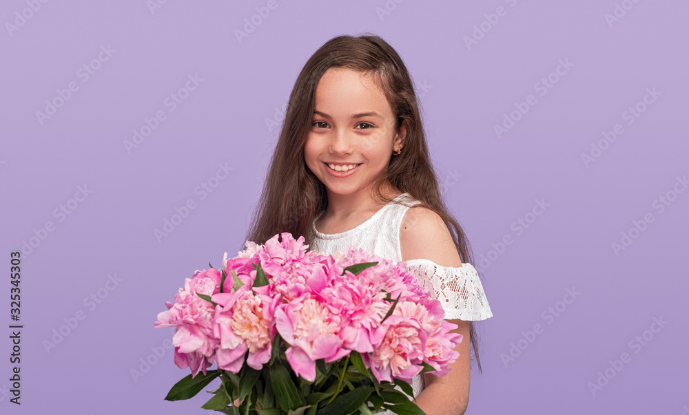 Adorable little girl with peony bouquet