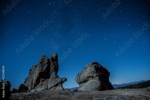 Fototapeta Rock under the night stars