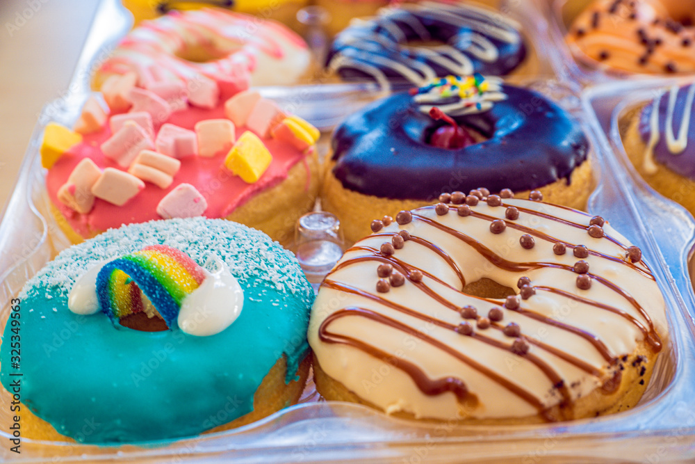 multi-colored donuts on the table