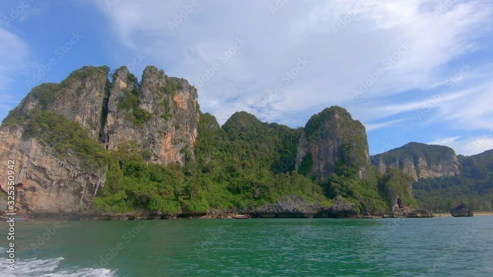 SLOW MOTION | View of lush islands in Thailand from a boat SLOW MOTION | View of lush islands in Thailand from a boat