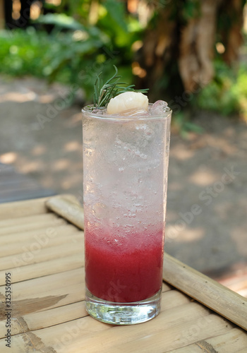 italian iced lychee soda with natural background