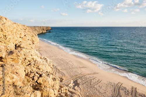 Beautiful sand beach. Turtle tracks on sand in Ras al Jinz turtle reserve,  Oman