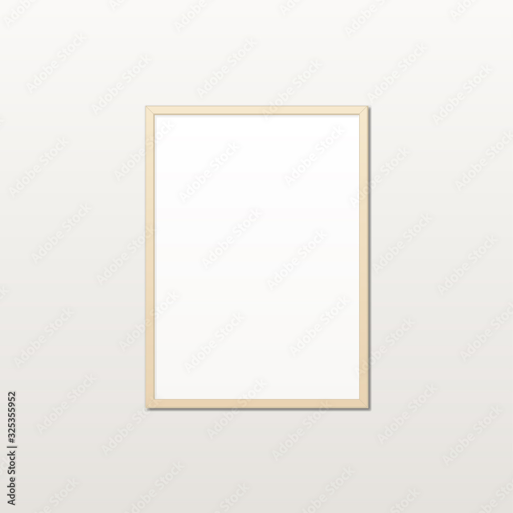 Realistic white poster in a wooden frame on a light wall Realistic white poster in a wooden frame on a light wall